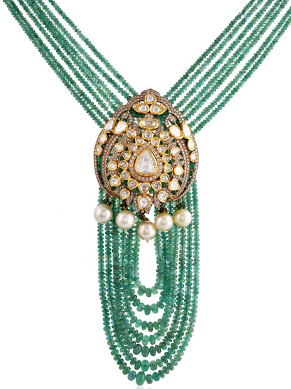 Green beaded necklace with a decorative clasp on a white background