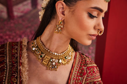 Tarang gold earrings