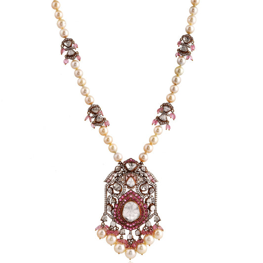 Elegant necklace with gemstones and pearls on a white background