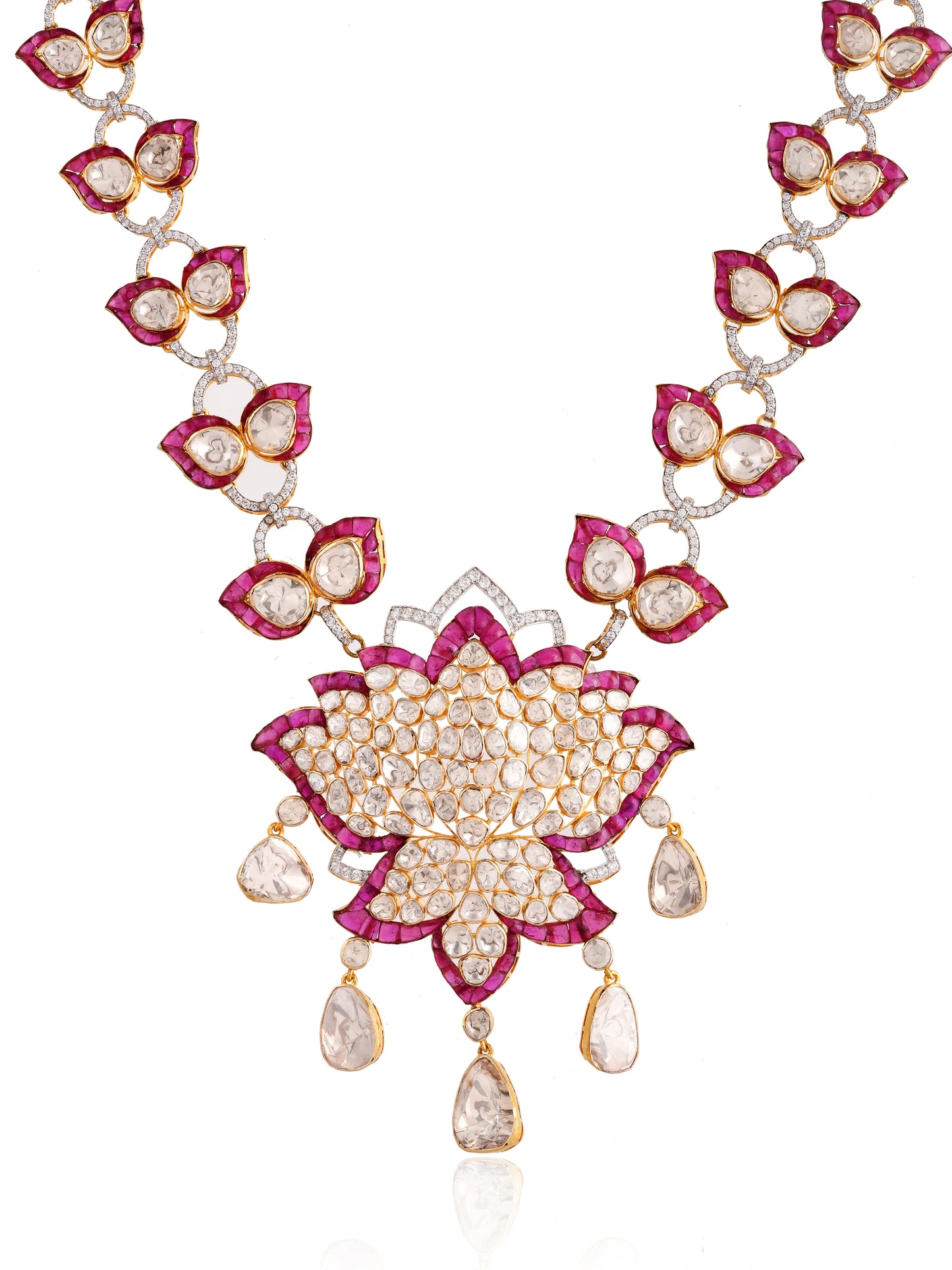 Ornate necklace with floral design and gemstones on a white background