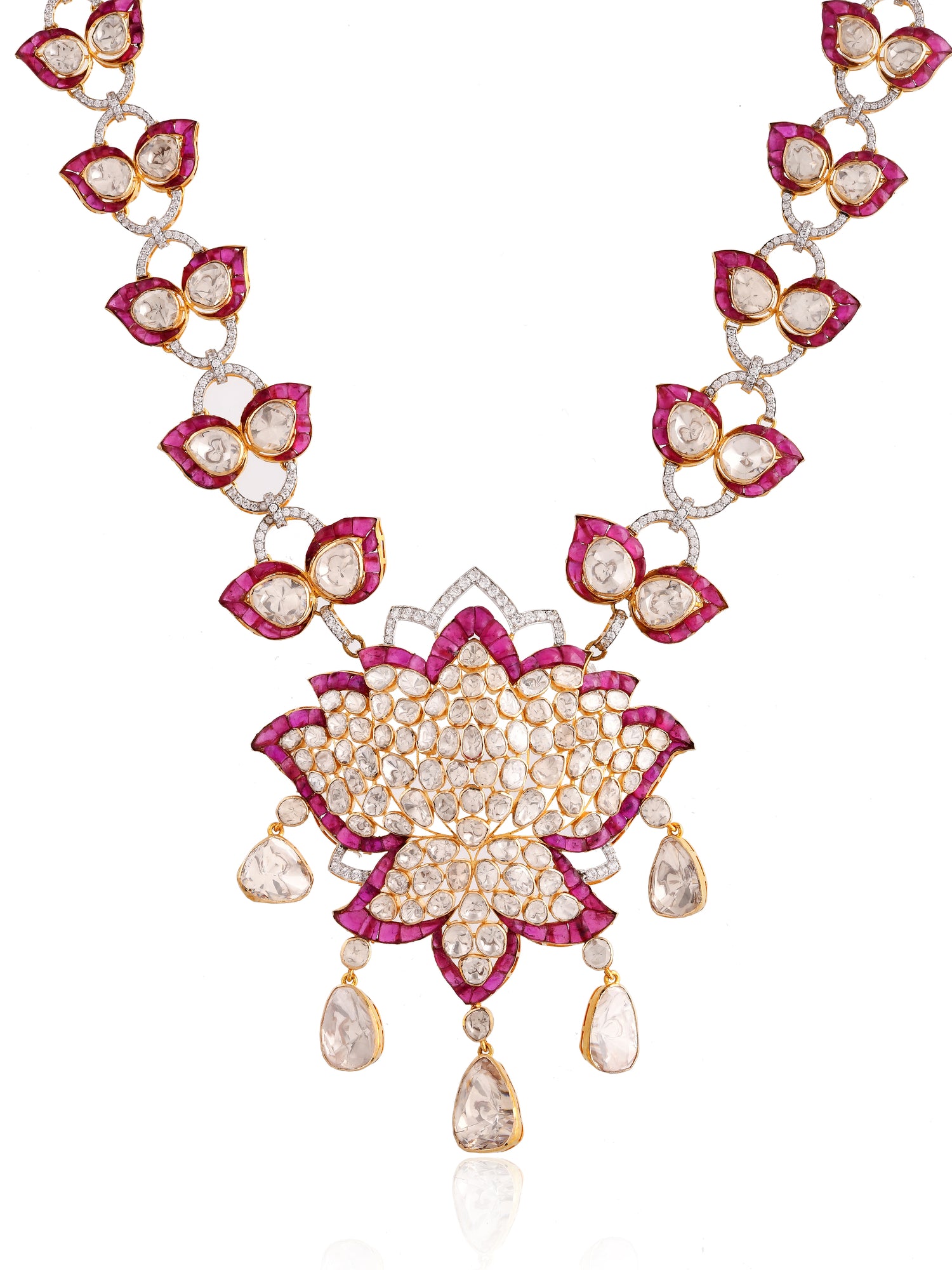Ornate necklace with floral design and gemstones on a white background