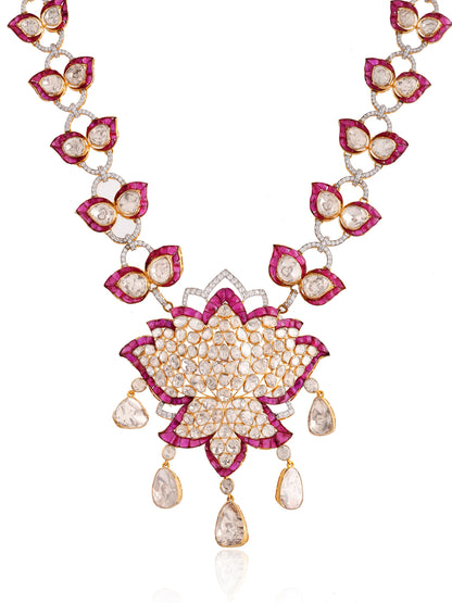 Ornate necklace with floral design and gemstones on a white background